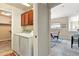 Convenient laundry area with cabinetry is located near the dining room at 6292 Kilmer Loop # 201, Golden, CO 80403