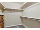 Walk-in closet is ready for organizing with installed shelving at 6292 Kilmer Loop # 201, Golden, CO 80403