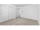 This bedroom offers neutral carpet and a large closet, providing ample storage and a clean, modern feel at 10933 E 115Th Pl, Commerce City, CO 80640