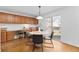 Cozy dining area with desk space, adjacent to sliding glass door at 10933 E 115Th Pl, Commerce City, CO 80640