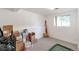 Unfinished basement area with natural light and carpeting, ready for customization at 6994 W Hinsdale Dr, Littleton, CO 80128