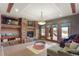 Spacious basement recreation area with fireplace and walkout access at 4691 Bandera Pl, Parker, CO 80134