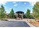 Exterior view of a community clubhouse with landscaping at 4691 Bandera Pl, Parker, CO 80134
