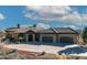 Stunning home featuring a tile roof, stone accents, and a spacious three-car garage at 4691 Bandera Pl, Parker, CO 80134