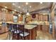Gourmet kitchen with granite countertops and custom cabinetry at 4691 Bandera Pl, Parker, CO 80134