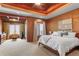 Bright main bedroom with sitting area and large windows at 4691 Bandera Pl, Parker, CO 80134