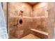 Large walk-in shower with tiled walls and seat at 4691 Bandera Pl, Parker, CO 80134