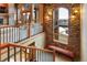Open staircase with wrought iron railings and scenic views at 4691 Bandera Pl, Parker, CO 80134