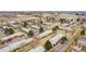 Drone shot of a well-planned community with townhouses, mature trees, and convenient highway access at 5721 W 92Nd Ave # 53, Westminster, CO 80031