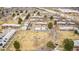 Bird's-eye perspective of townhomes with solar panels, green spaces, and proximity to local roadways at 5721 W 92Nd Ave # 53, Westminster, CO 80031