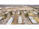 Expansive aerial view of tidy residential community, highlighting convenient location near shops and highway at 5721 W 92Nd Ave # 53, Westminster, CO 80031