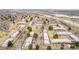 Comprehensive aerial photo of a community boasting tidy townhouses, parking, and a network of roads at 5721 W 92Nd Ave # 53, Westminster, CO 80031