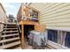 Cozy backyard deck with stairs, offering outdoor space for relaxation and storage beneath at 5721 W 92Nd Ave # 53, Westminster, CO 80031