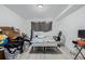 Bedroom with wood-look floors and furniture at 5721 W 92Nd Ave # 53, Westminster, CO 80031