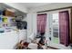 Functional laundry room featuring a washer, dryer, and ample storage for convenience at 5721 W 92Nd Ave # 53, Westminster, CO 80031