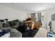 Spacious living room with a cozy couch and lots of natural light perfect for relaxing at 5721 W 92Nd Ave # 53, Westminster, CO 80031
