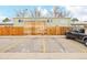 Assigned parking area with yellow lines and spaces in front of a building at 5721 W 92Nd Ave # 53, Westminster, CO 80031