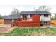 Spacious backyard deck with access stairs and yard at 9380 Raleigh Ct, Westminster, CO 80031