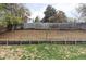 Large backyard with wooden retaining walls and garden space at 9380 Raleigh Ct, Westminster, CO 80031