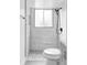 Bathroom featuring a modern toilet, glass-enclosed shower with modern hardware and finishes at 9380 Raleigh Ct, Westminster, CO 80031