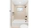 Contemporary bathroom with modern fixtures, a showerhead, and a sleek bathtub at 9380 Raleigh Ct, Westminster, CO 80031