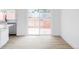 Kitchen with sliding door leading to outside deck and outdoor space at 9380 Raleigh Ct, Westminster, CO 80031