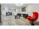 Finished basement with modern furniture and decorative art pieces at 1498 S Perry St, Denver, CO 80219