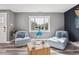 Bright living room offering serene views, comfortable seating, and modern decor, creating a peaceful atmosphere at 1498 S Perry St, Denver, CO 80219