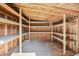 The shed's interior is complete with wood framing and shelving to maximize storage at 1498 S Perry St, Denver, CO 80219