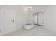 Stylish bathroom featuring a freestanding tub, modern shower, and elegant chandelier at 3299 S Newcombe St, Lakewood, CO 80227
