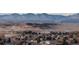 This image showcases a charming neighborhood with a stunning mountain view, making it an attractive location at 3299 S Newcombe St, Lakewood, CO 80227