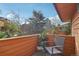 Balcony with a chair and a plant overlooking lush greenery at 9400 E Iliff Ave # 181, Denver, CO 80231