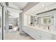 Bathroom featuring tile floors, double sink vanity, and a large mirror at 9400 E Iliff Ave # 181, Denver, CO 80231