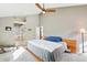 Spacious bedroom featuring ceiling fan with attached bathroom at 9400 E Iliff Ave # 181, Denver, CO 80231