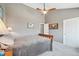 Neutral bedroom with ceiling fan and carpeted floor at 9400 E Iliff Ave # 181, Denver, CO 80231
