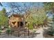 Exterior shot of a well-maintained home with lush landscaping and inviting curb appeal at 9400 E Iliff Ave # 181, Denver, CO 80231