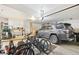 Well-organized garage space with parking and storage, perfect for hobbies and vehicle maintenance at 9400 E Iliff Ave # 181, Denver, CO 80231