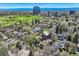 Stunning aerial view showcasing neighborhood with golf course, cityscape, and lush trees at 171 N Franklin St, Denver, CO 80218