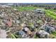 Aerial view showing a home in a residential area with the Denver Country Club nearby at 171 N Franklin St, Denver, CO 80218