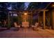 Charming back patio with comfortable seating under a pergola and lush greenery at 171 N Franklin St, Denver, CO 80218