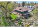 Beautiful home featuring a lush garden, landscaped yard, and a charming pergola at 171 N Franklin St, Denver, CO 80218