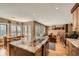 Modern kitchen with granite countertops, hardwood floors, stainless steel appliances and dining area at 171 N Franklin St, Denver, CO 80218