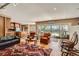 Open-concept living room and kitchen with hardwood floors and ample natural light at 171 N Franklin St, Denver, CO 80218