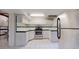 Efficient kitchen has new appliances, bright lighting, and lots of storage space at 505 N Logan St # 14, Denver, CO 80203