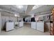 Functional laundry room equipped with multiple washers and dryers for convenient laundry tasks at 505 N Logan St # 14, Denver, CO 80203