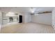 Living room view of bright, efficient kitchen with stainless steel appliances at 505 N Logan St # 14, Denver, CO 80203