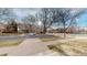 An inviting view of the street showing the building, sidewalk, and landscaping at 505 N Logan St # 14, Denver, CO 80203