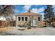Backyard featuring gravel, patio and fencing at 1621 Trenton St, Denver, CO 80220