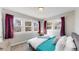 Cozy bedroom featuring multiple windows, plush carpeting, and warm, inviting colors at 1621 Trenton St, Denver, CO 80220