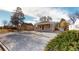 Charming single-story home with a cozy front porch and a tidy front yard at 1621 Trenton St, Denver, CO 80220
